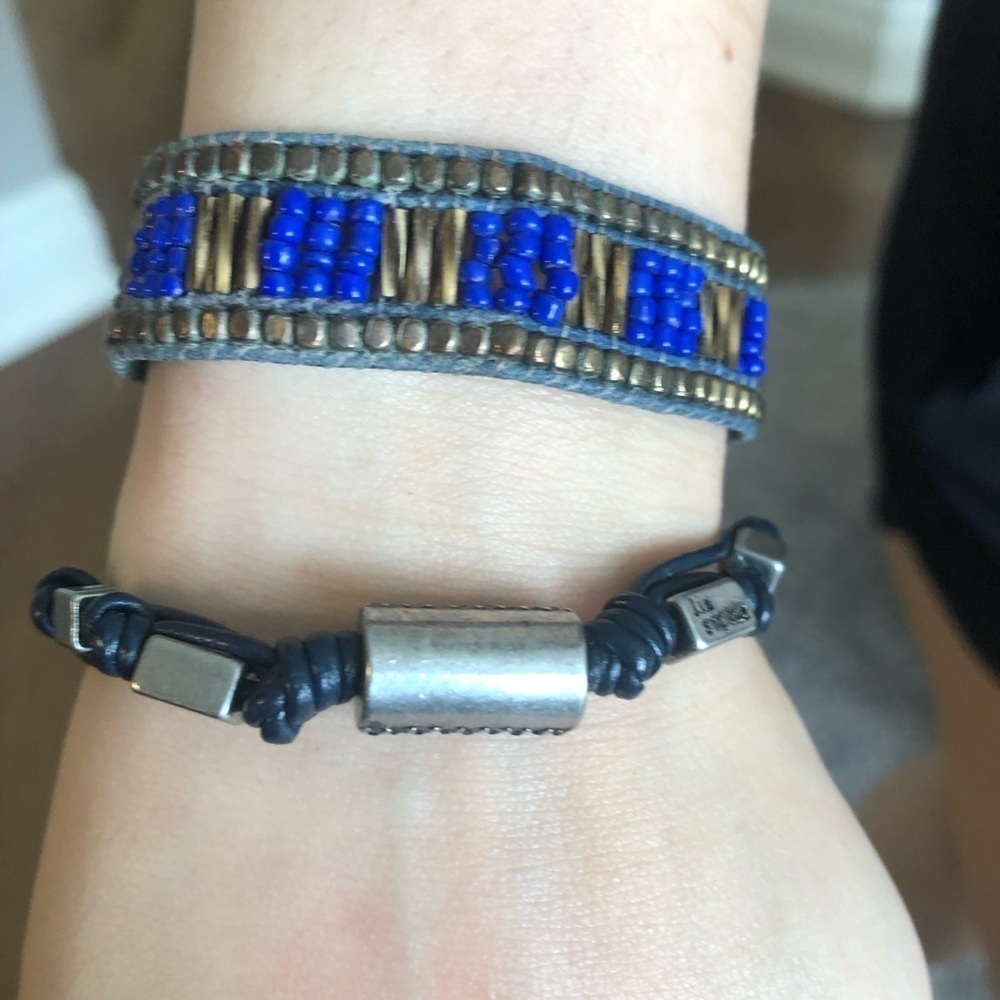 Two beaded bracelets blue in colour one branded
